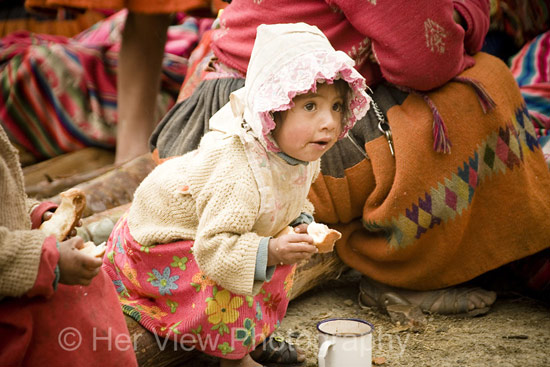 Girl and her special treats - hot chocolate and bread