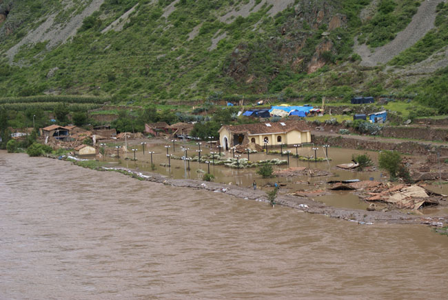 Homes washed away by the river