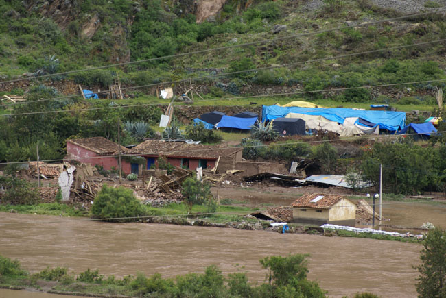 SONY DSC Homes washed away by the river