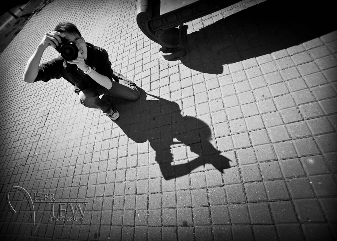 a photographer participant and his shadow